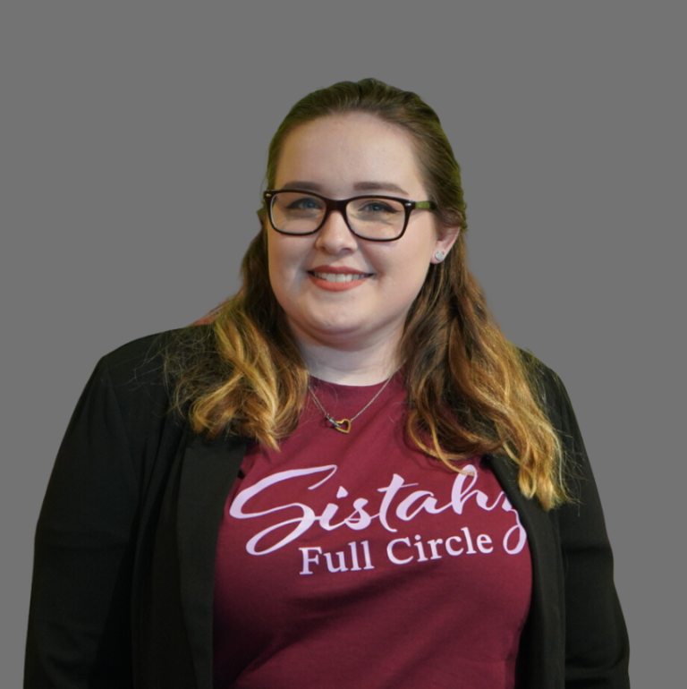 Headshot of Taylor Redd, Marketing Web and Graphic Design